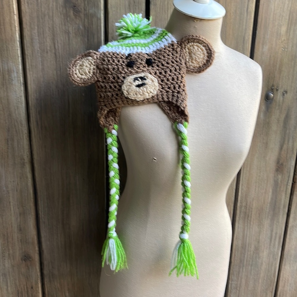 Child’s monkey hat hand crochet with braided ties with tassels, ears and Pompom